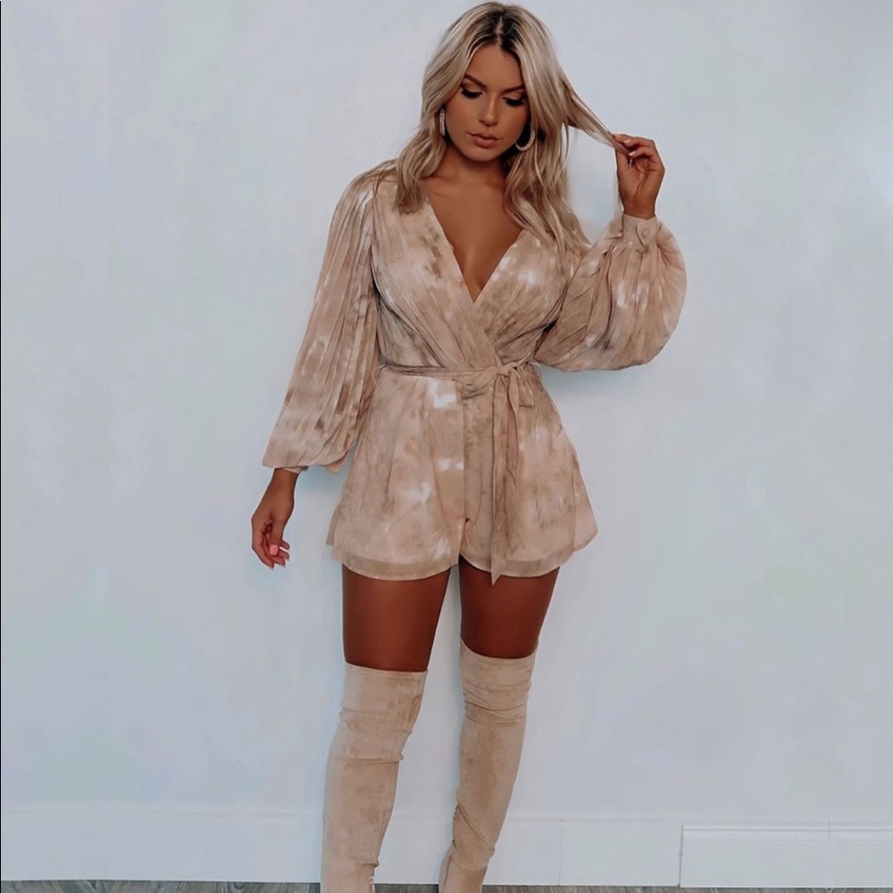 “Caught in a Daze Romper”